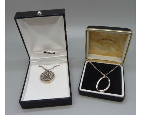 A Kit Heath silver pendant and chain and a silver leopard's head pendant and chain 