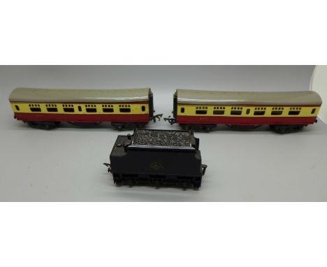 Two Tri-ang 00 gauge model railway carriages and a coal wagon 