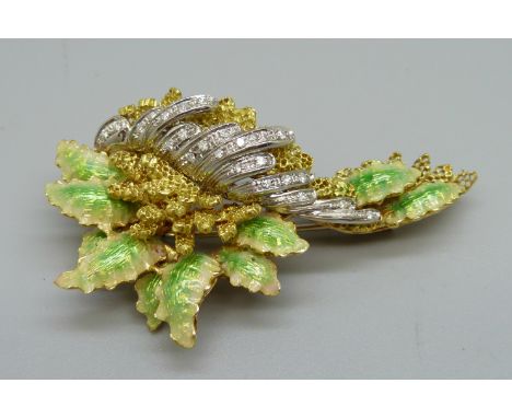 An 18ct gold, diamond and enamel spray brooch, made in Italy in the 1960's, set with twenty-four diamonds, marked 750, 30.8g,