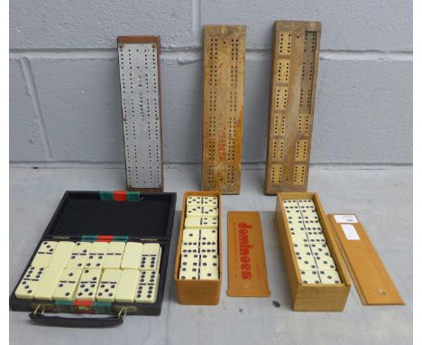 Three cribbage boards, including one marked HMS Warspite, and three sets of dominoes 