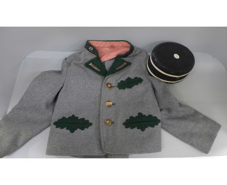A WWII German Hitler Youth jacket and cap, (fit 4-6 yrs approximate)
