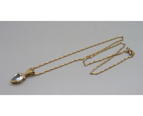 A 9ct gold and topaz pendant and chain, 4.5g, chain 39cm 