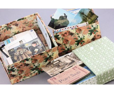 Plastic container with 3 boxes of postcards of the world some vintage some modern