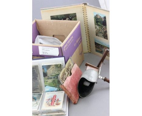 Four albums of postcards, birthday cards and photos including vintage plus loose modern postcards and an Underwood & Underwoo