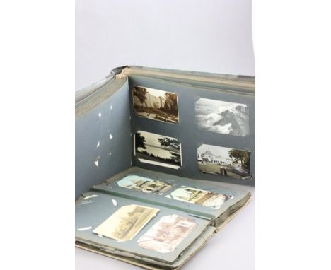 Two postcard albums with a quantity of vintage postcards including many UK towns & cities, portraits etc