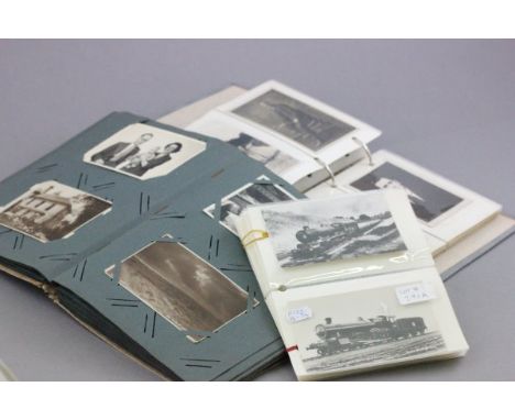 Album of vintage postcards and an album of portrait cards and b/w photographs plus railway postcards