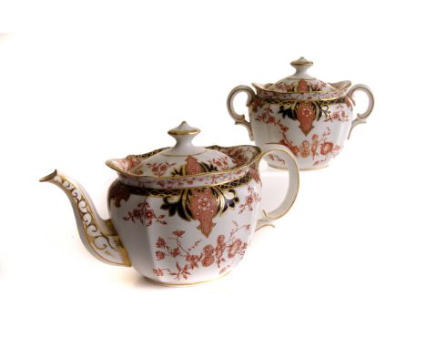 A Royal Crown Derby bone china tête à tête tea set of serpentine design and in the Imari pallette, including a tea pot, milk 