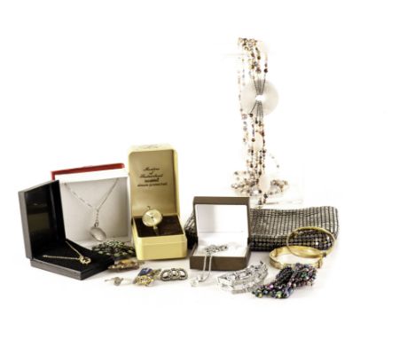 A collection of costume jewels, inc. a pair of shoe buckles, hallmarked silver bangle, brooches and more