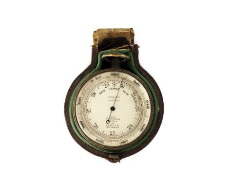 A pocket barometer and compass by Short & Mason London, for A &N.C.S. Ltd Westminster. In part leather and wood case, brass a