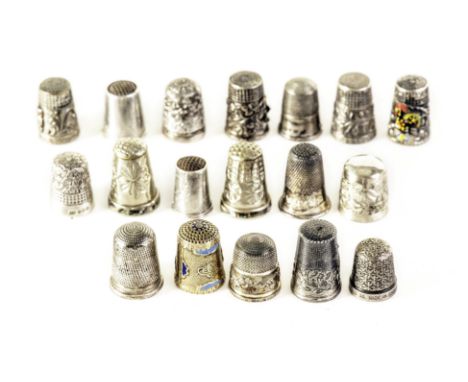 A collection of silver and white metal thimbles, each having various design, some with enamel decoration (parcel)