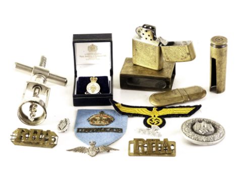 A RAF Sweetheart brooch,  dated Birmingham 1964, three German Third Reich badges, a Zippo lighter, trench art vest case and o