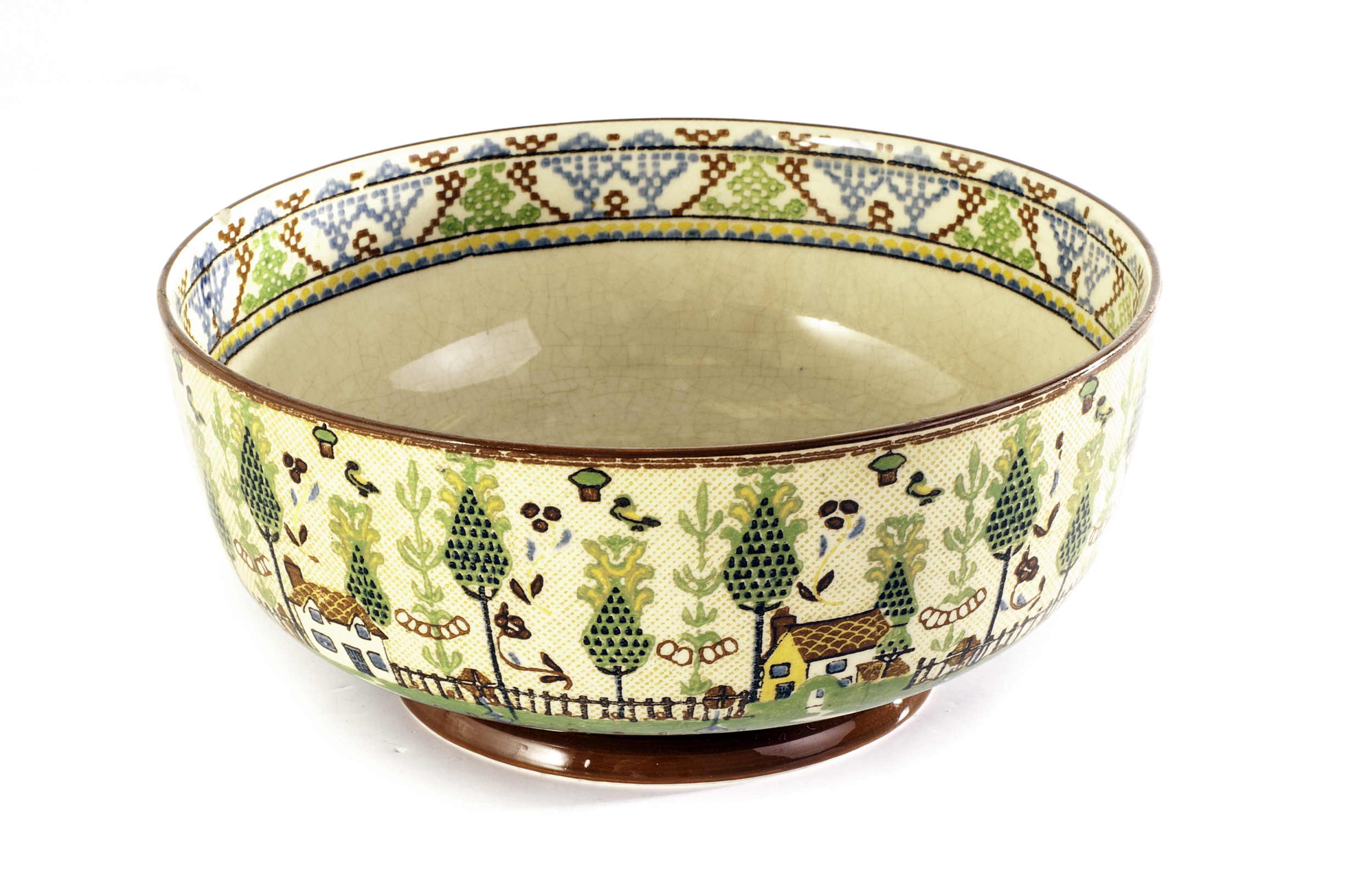 A Royal Doulton Sampler pattern bowl, decorated with printed needlework