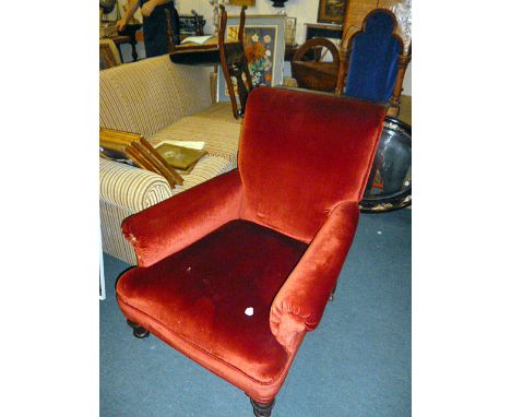 A Victorian mahogany scroll back armchair, on turned legs, together with an oak stick stand (2)