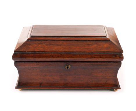 A rosewood sarcophagus tea caddy, converted to a cigarette box, and supported on brass ball feet 36.5cm wide