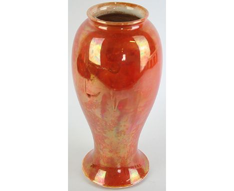 A Ruskin orange lustre vaseOf inverted baluster form, impressed factory marks and dated 1920 to base, height 27cm   CONDITION