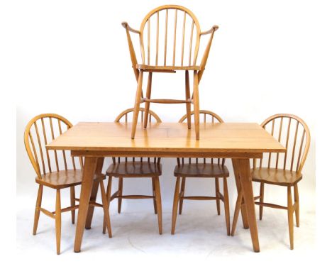 A Mid Century dining suiteComprising light oak extending table, the under-tier with bolt system to release the extra leaf thr