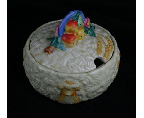A Clarice Cliff Harvest preserve jar and coverHeight 9cm