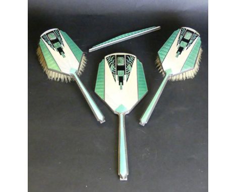 A fine Art Deco hallmarked silver and guilloche enamel four piece dressing table setComprising hand mirror, two hair brushes,