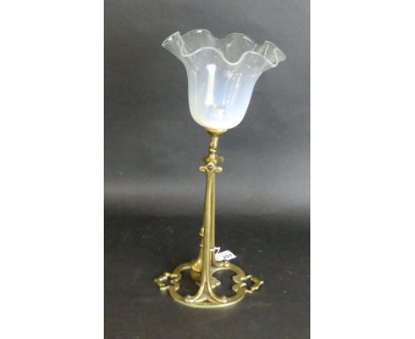 An Arts & Crafts style brass swing table lamp With milk glass shade, height 37cm