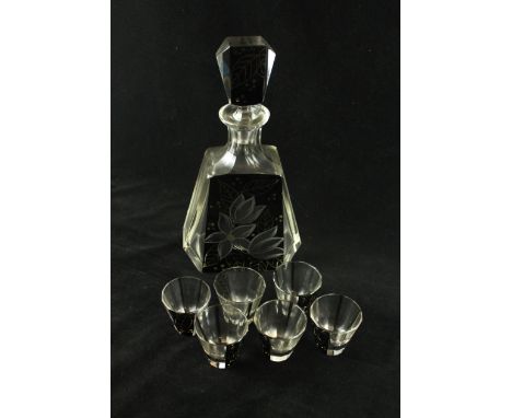 An Art Deco glass seven piece drinking setComprising decanter of tapering form, height 28cm, six glasses of circular form, he