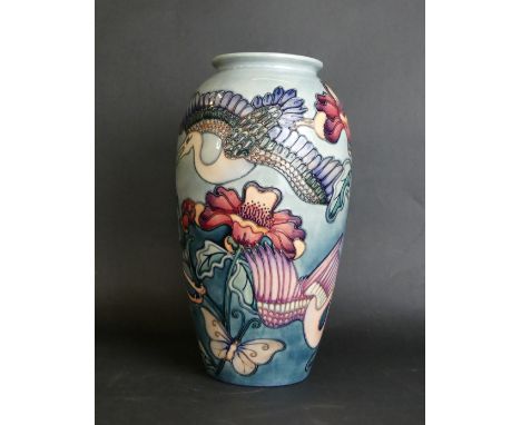 A large and impressive modern Moorcroft trial vaseOf ovoid form, decorated with storks, butterfly and floral sprays on a ligh
