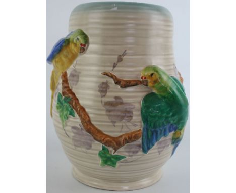 A Clarice Cliff Budgerigar vaseOf inverted cylindrical form, relief decorated with two Budgerigars, printed factory marks to 