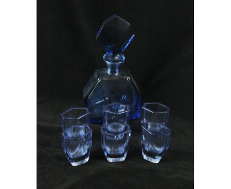 An Art Deco blue glass seven piece drinking setComprising decanter of conical form, height 25cm, six shot glasses, height 7.5