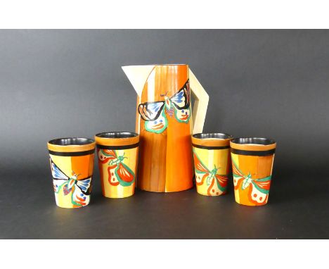 A rare Clarice Cliff Fantasque drinking setDecorated in the 'Butterfly' pattern, circa 1929-1930, comprising conical jug, hei