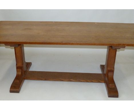 An Arts & Crafts Heal & Son light oak refectory dining tableRaised on block supports, height 76cm, length 213cm.