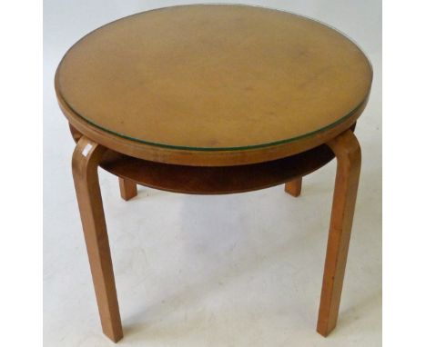 Alvar Aalto bentwood circular topped coffee tableWith plywood shelf undertier, height 57cm, and stamped made in Finland to un
