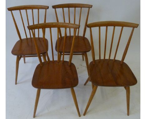 Four Mid Century Ercol light elm spindle back dining chairsHeight 79cm 