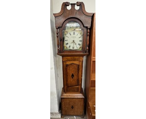 A 19th century oak and mahogany longcase clock, the hood with a broken swan neck pediment and turned columns above a short tr