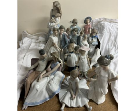 A collection of Nao figures including a mother and child, wedding couple, children, geese etc 