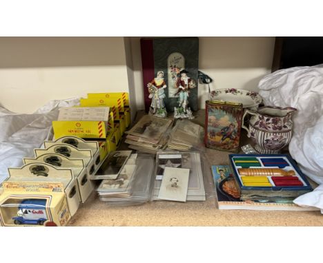 Assorted Postcards photographs, together with a photograph album, model cars, pottery figures etc