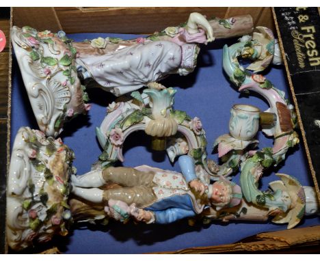 Pair of continental ceramic candlesticks with applied floral decoration (A/F)