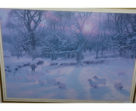 Large framed print depicting sheep in snowy landscape 