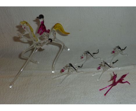 Glass hunting set comprising of huntsman, four hounds and a fox