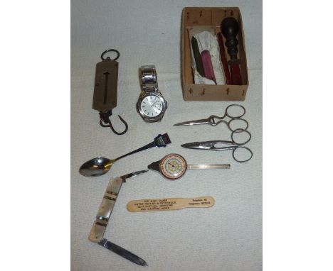 Salter parcel post balance scale, map measure, Loris wrist watch on metal strap, mother of pearl fruit knife, bone advertisin