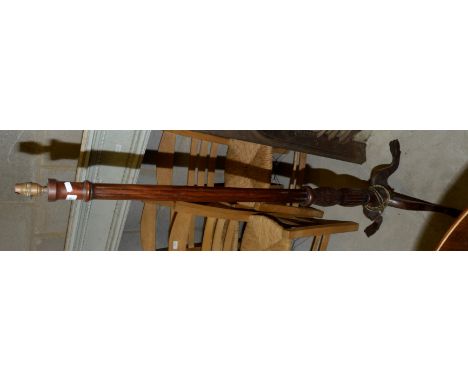 Mahogany fluted standard lamp on ball and claw feet 