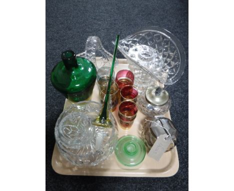 A tray of assorted glassware including lead crystal bowls and baskets, green glass liqueur decanter with stopper, sugar basin