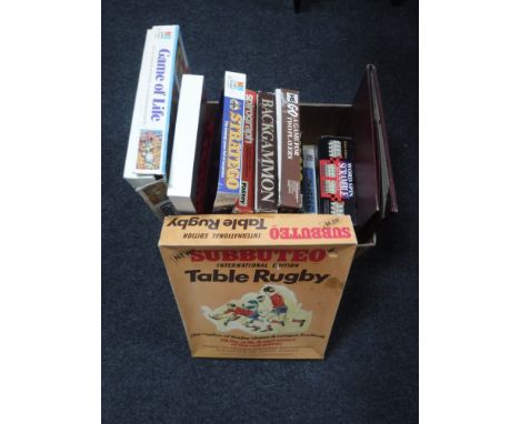 A box of vintage board games, Subbuteo, table rugby, blow football and a Quick Drawer Company draughtsman's set 