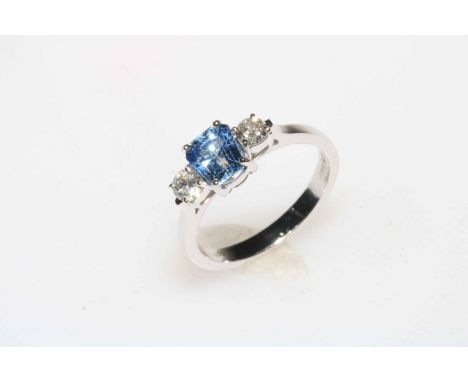 Ceylon sapphire and diamond three stone ring set in 18 carat white gold, size O.