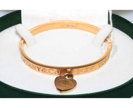 Tiffany &amp; Co gold coloured bangle.