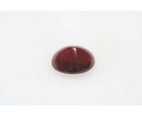 Loose cabachon ruby weighing approximately 20 carats.