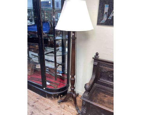 Mahogany reeded column tripod standard lamp and silk shade.