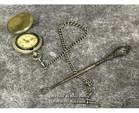 A floating compass with hallmarked silver chain and silver hallmarked button hook / T42 