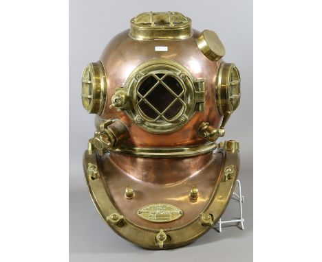 A full size brass and copper U.S Navy deep sea divers helmet.