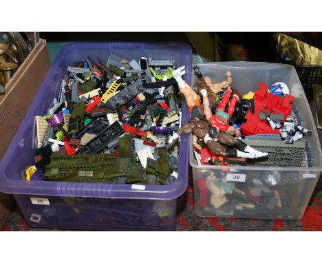 A box of Lego along with a box of vintage action figures.