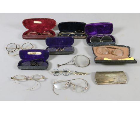 A collection of vintage and antique spectacles and cases to include pinchbeck examples.