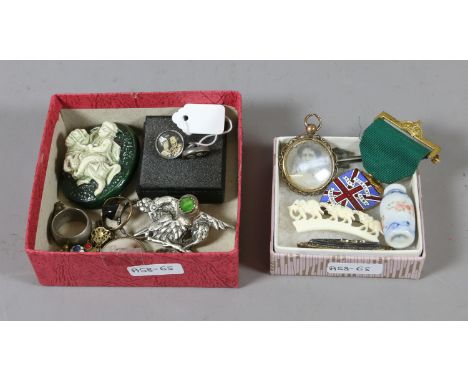 A collection of jewellery, enamel badges and pendants etc.